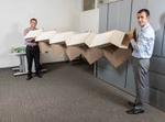 Origami tubes assembled into stiff, yet reconfigurable structures and metamaterials