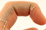 E-tattoos turn knuckles and freckles into smartphone controls