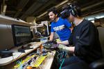 A glove powered by soft robotics to interact with virtual reality environments