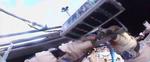 Spacewalking cosmonauts release 3-D-printed satellite