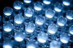 The Microscopic Origin of Efficiency Droop in LEDs