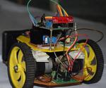 DTMF and Gesture Controlled Robotic Wheelchair