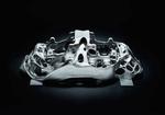 World premiere: brake caliper from 3-D printer - Bugatti develops world’s largest titanium functional component produced by additive manufacturing