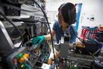 Artificial Intelligence Accelerates Discovery of Metallic Glass