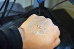 Researchers 3-D print electronics and cells directly on skin
