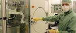 Breakthrough in photonics: data-transmitting light signal gets power boost from nanosized amplifier