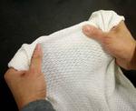 Scientists Develop First Fabric to Automatically Cool or Insulate Depending on Conditions