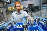 Smart glove for Industry 4.0: Connecting the physical hand to the virtual world