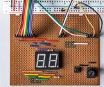 Dual 7-segment Displays Controlled by Potentiometer in CircuitPython - Demonstration of Persistence of Vision