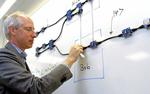 Spreading light over quantum computers