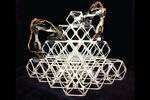 Assembler robots make large structures from little pieces