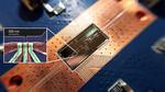 Silicon Quantum Bits Communicate over Relatively Long Distance