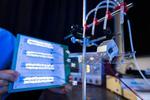 CityU new droplet-based electricity generator: A drop of water lights up 100 small LED bulbs