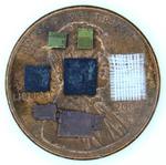 Tiny transformer inside: Decapping an isolated power transfer chip