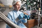 Pinning down the ampere with a supersensitive particle detector