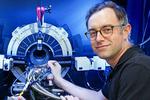A New Approach for Studying Electric Charge Arrangements in a Superconductor