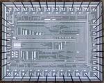Reverse-engineering an early calculator chip with four-phase logic