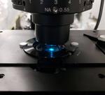 Light-Shrinking Material Lets Ordinary Microscope See in Super Resolution
