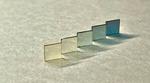 A new theory to explain the transparency of metallic oxides