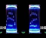 Glowing Air-Bubble Clock in Water