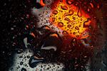 How positively and negatively charged ions behave at interfaces
