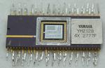 Reverse-engineering the Yamaha DX7 synthesizer’s sound chip from die photos