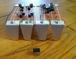 The Famous NE555 Timer-IC, Original and a Bit Larger