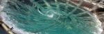 Whirlpools with the symmetries of squares and tetrahedrons observed in an exotic quantum superfluid