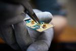 Electron pairing in quantum dots as new approach to qubit research