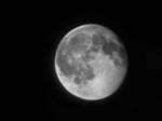 Flat, pancake-sized metalens images lunar surface in an engineering first