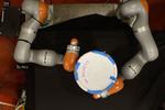 AI helps robots manipulate objects with their whole bodies
