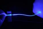 Soft optical fibers block pain while moving and stretching with the body