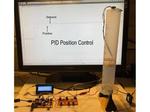 PID Position Control of a Levitating Balsa Disc Assembly