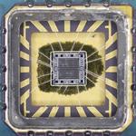 Inside an unusual 7400-series chip implemented with a gate array
