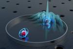 Two atoms playing ping-pong